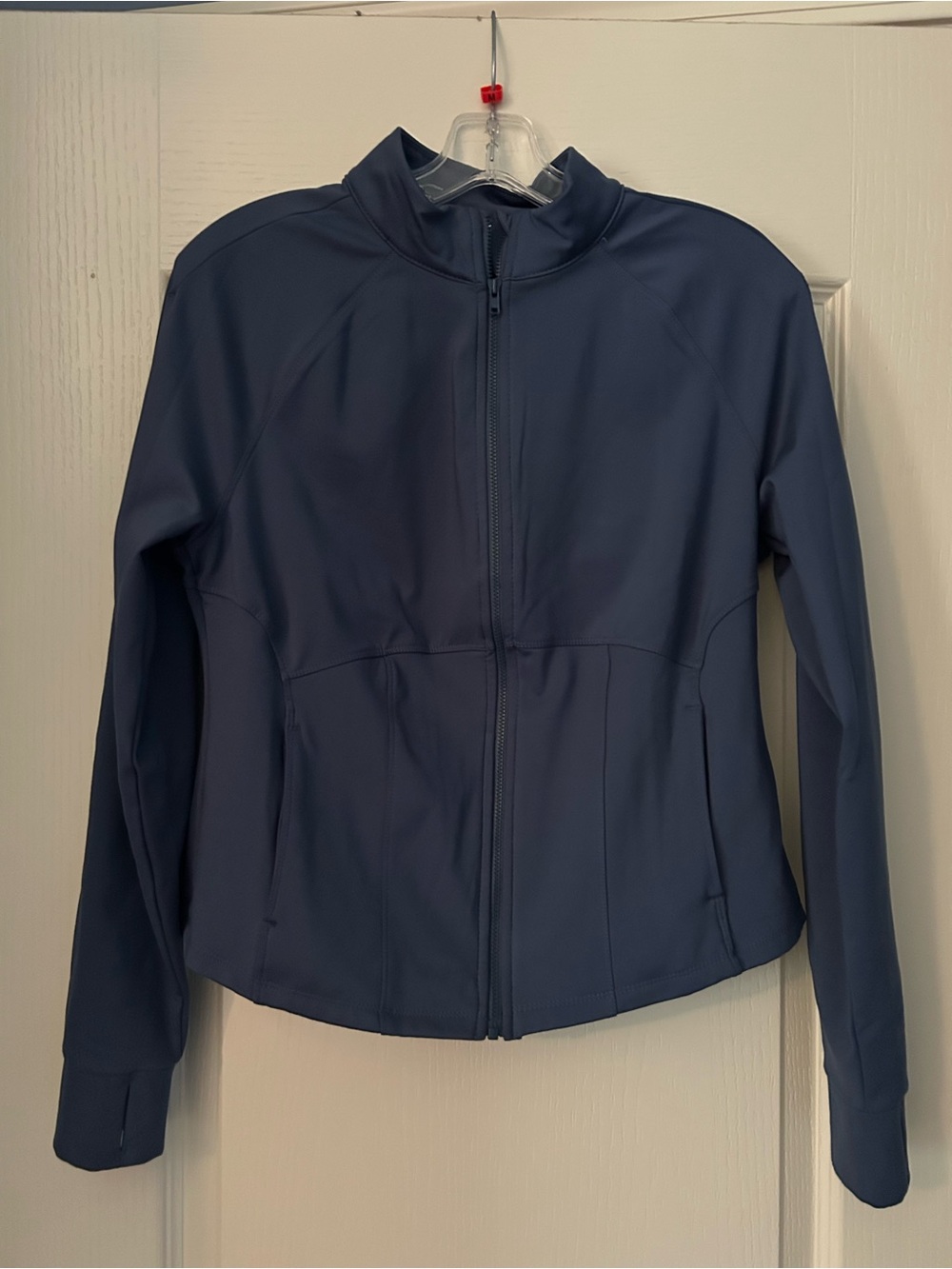 Women’s extra warm medium blue jacket pockets is full zip  blue